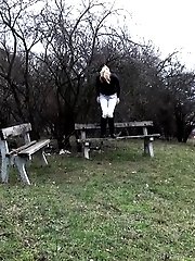 15 pictures - Hot blonde pisses while on a park bench