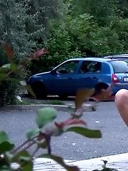 15 pictures - Redhead babe leans against a post to pee