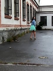 15 pictures - Sexy brunette lifts up her dress to piss