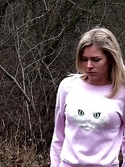 15 pictures - Blonde babe Claudia pisses down a drain outside