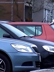 15 pictures - Redhead babe leans against a post to pee