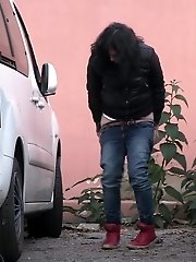 15 pictures - Hot dark haired girl pisses outside