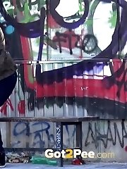 15 pictures - Blonde has fun as she pees while standing