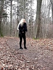 15 pictures - Blonde babe squatting to pee outside in the woods