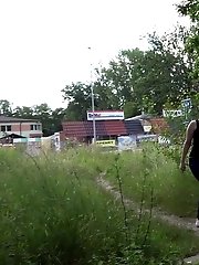 15 pictures - Dark haired girl gets her ass wet by pissing