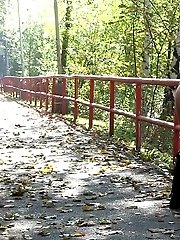 15 pictures - Hot blonde shows off her ass while peeing