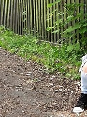 15 pictures - Gorgeous brunette leaves a wet patch of pee