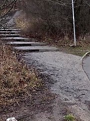 15 pictures - Blonde babe Claudia pisses down a drain outside