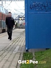 15 pictures - Blonde needs to piss on the train platform
