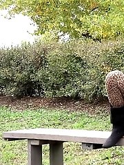 15 pictures - Dark haired babe in leggings pisses outside