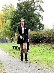 15 pictures - Dark haired babe in leggings pisses outside
