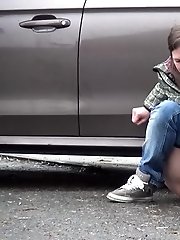 15 pictures - Two friends piss behind a parked car