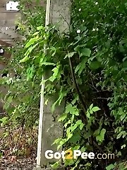 15 pictures - Cute pregnant babe pisses outside in the forest