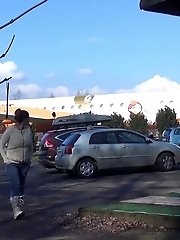 15 pictures - Pretty brunette pisses in public by the airport