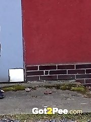 15 pictures - Pretty blonde squats on concrete to piss