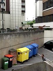 15 pictures - Hot brunette pisses in the middle of the city