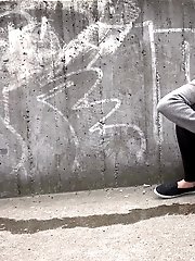 15 pictures - Hot brunette pisses in the middle of the city