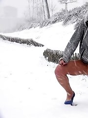 15 pictures - Sexy girl melts snow as she pisses outside