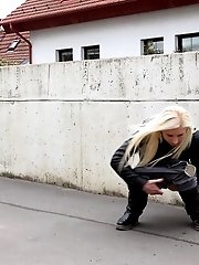 15 pictures - Blonde pulls down her denims and pisses