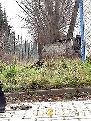 15 pictures - Redhead babe pisses in the middle of the city