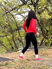 15 pictures - Dark haired European pisses outside by river