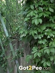 15 pictures - Gorgeous babe is desperate to pee outside