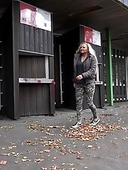 15 pictures - Cute blonde pisses in public in the city
