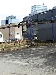 15 pictures - Dark haired girl pisses by a public car park