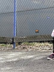 15 pictures - Dark haired girl pisses by a public car park