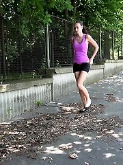 15 pictures - Sexy dark haired babe pisses outside