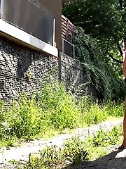 15 pictures - Pretty girl in pink dress pisses outside