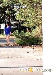 15 pictures - Raven haired babe leaves a piss puddle outside
