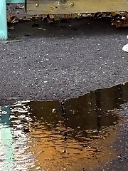 15 pictures - Raven haired babe leaves a piss puddle outside