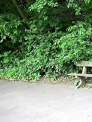 15 pictures - Redhead smokes and pisses in this scene