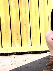 15 pictures - Raven haired babe leaves a piss puddle outside