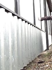 15 pictures - Sexy brunette babe pisses behind a bus stop