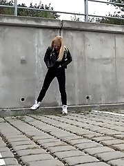 15 pictures - Sexy blonde squats outside to piss in the city