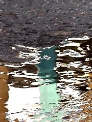 15 pictures - Raven haired babe leaves a piss puddle outside