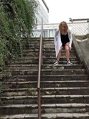 15 pictures - Cute girl in sneakers pisses on steps