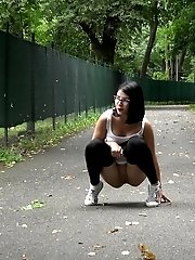 15 pictures - Exotic babe pulls down her leggings to piss