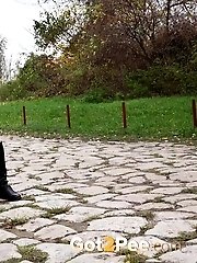 15 pictures - Gorgeous blonde in knee boots pisses outside