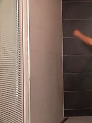 15 pictures - Pretty brunette sprays her piss onto the ground