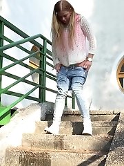 15 pictures - Redhead is desperate to pee while outside