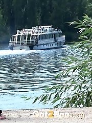 15 pictures - Pretty brunette sprays her piss onto the ground