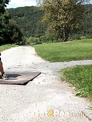 15 pictures - Sexy blonde pisses on a path in a golf course