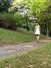 15 pictures - Gorgeous babe enjoys a sensual outdoor piss