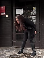 15 pictures - Raven haired babe empties her bladder outside