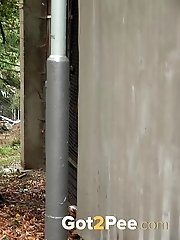 15 pictures - Chubby girl pulls up her dress to piss outside