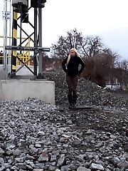 15 pictures - Hot blonde pisses right next to a railway line