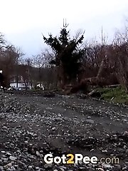 15 pictures - Hot blonde pisses right next to a railway line